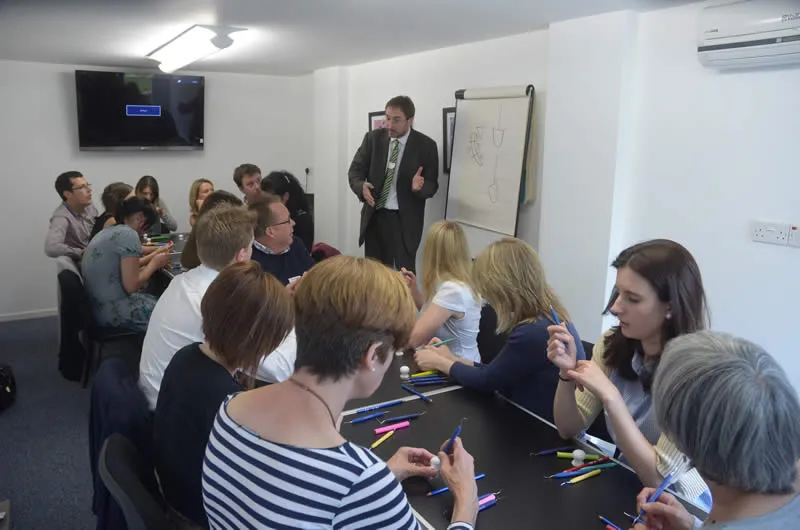 Dentists and hygienists at a teaching session